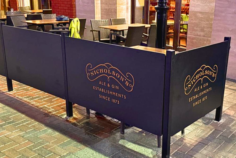 Metal barrier for restaurant